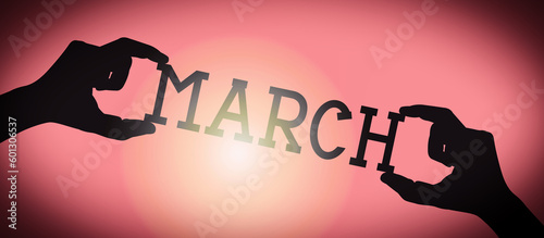March - human hands holding black silhouette word