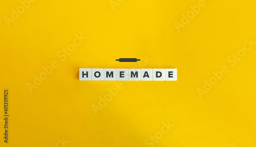 Homemade Word and Concept. Block Letter Tiles on Yellow Background. Minimal Aesthetics.