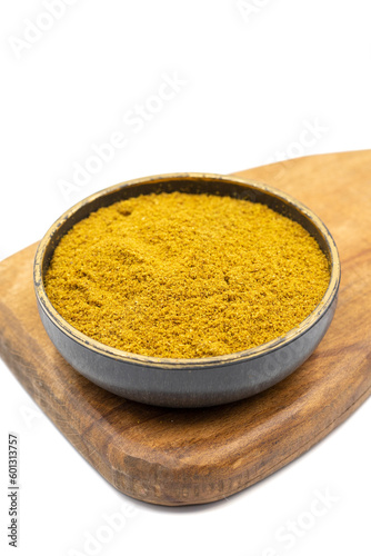 Ground cumin or Jeera Powder. Powder cumin spice in bowl isolated on white background. Dry spice concept. Close up