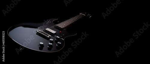 Sleek Black Electric Guitar on a Black Background with CopySpace - Ideal for Music Lovers and Rock Icons.	