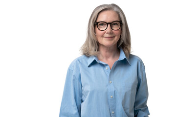 Elegant mid adult woman against transparent background. Stylish mature woman in blue casuals looking at camera and smiling