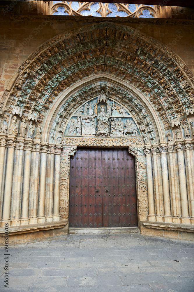 Polychrome Gothic portal of the church of Santa María la Real de Olite with biblical images with the Virgin Mary in the center of the tympanum