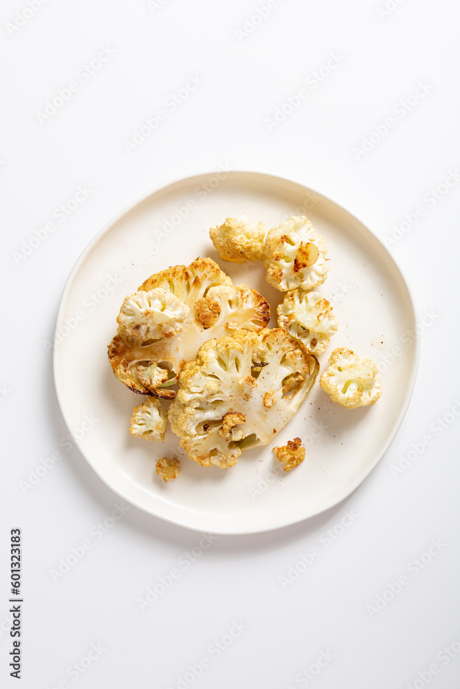 Vegan Cauliflower Steak on plate healthy food Vegan Cauliflower Steak on plate healthy food