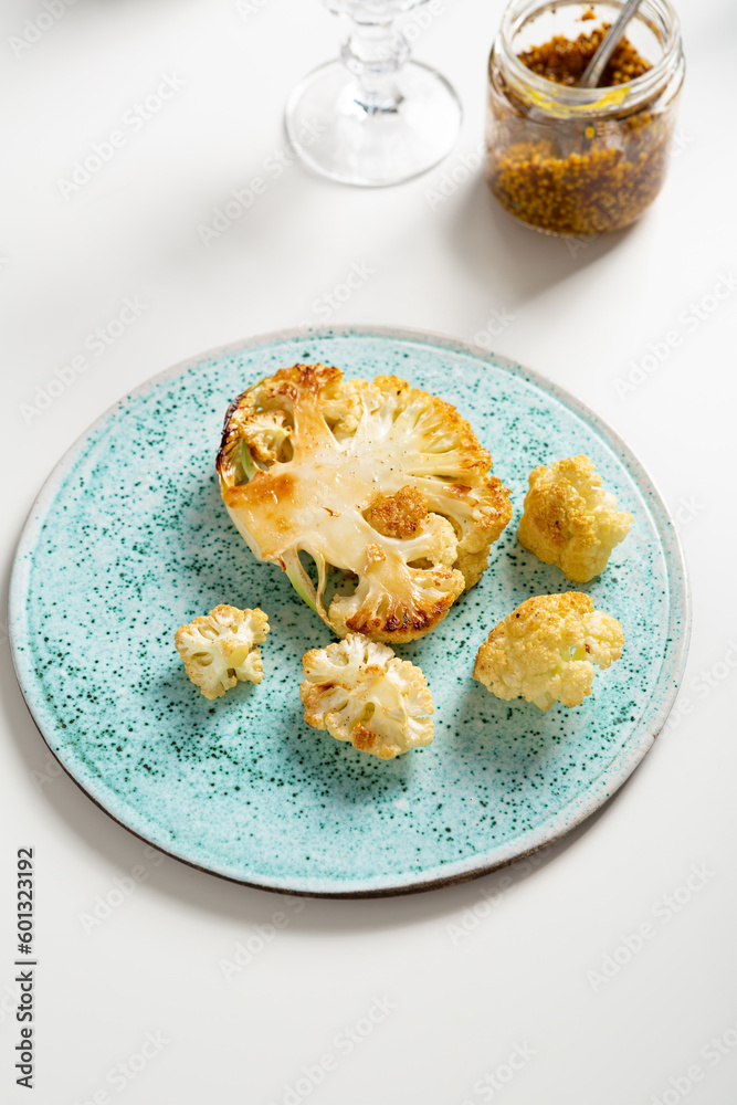 Vegan Cauliflower Steak close up on plate healthy food Vegan Cauliflower Steak close up on plate healthy food