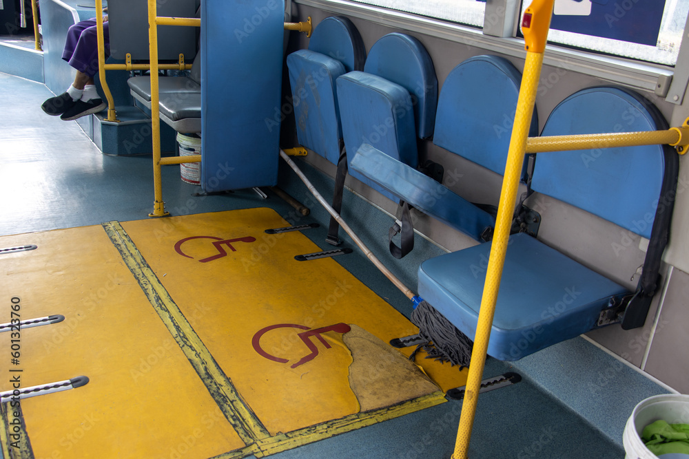 Empty seats for disabled people in a city bus, Bangkok, Thailand