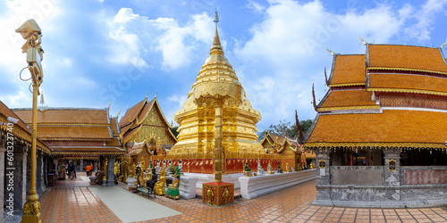 Amazing panorama view of Wat Phra That Doi Suthep with golden stupa and blue sky, the most famous temple in Chiang Mai, Thailand