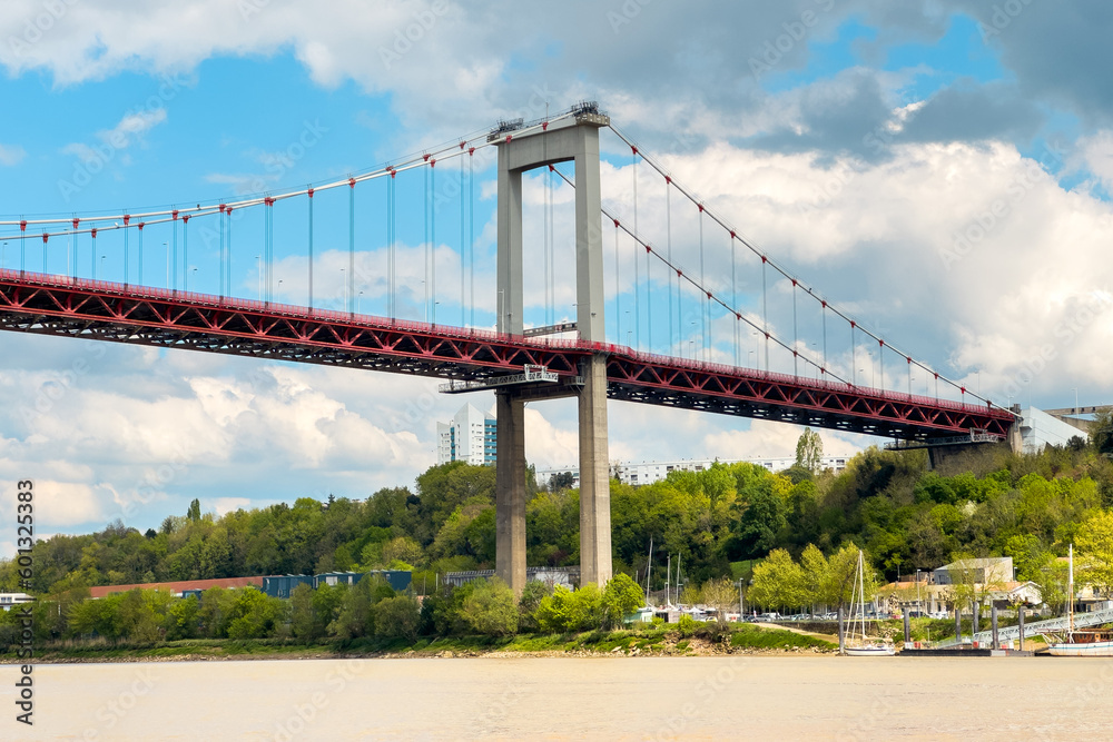 the pont d'Aquitaine is suspension bridge above the river Garonne in Bordeaux France. High quality photography
