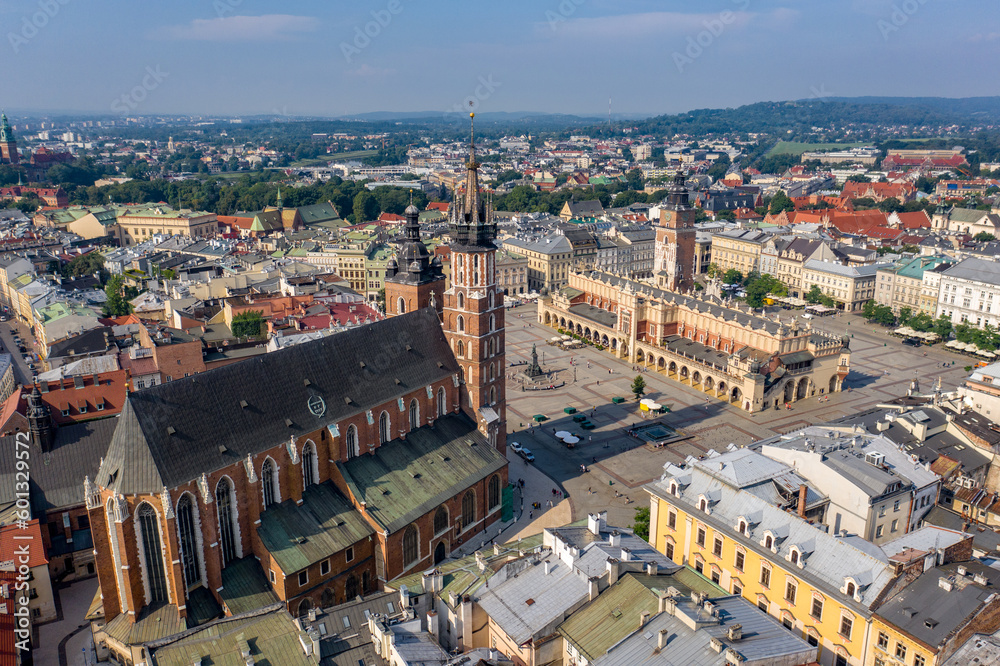 Saint Mary's Basilica and Kraków Cloth Hall - drone aerial view - Main Market Square on sunny day, Poland, Main Market Square