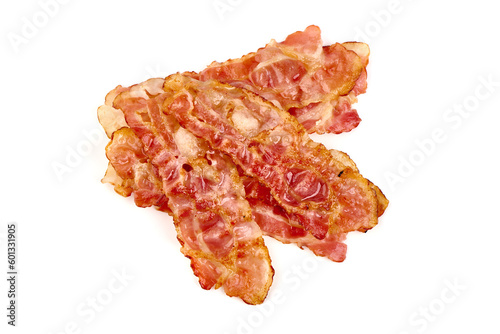 Cooked bacon rashers, close-up, isolated on white background.