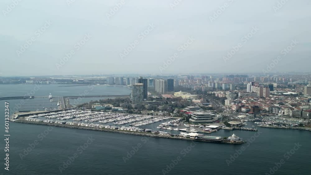 Atakoy Marina and Bakirkoy ferry with Istanbul city in the background zoom-out Atakoy Marina and Bakirkoy ferry with Istanbul city in the background zoom-out