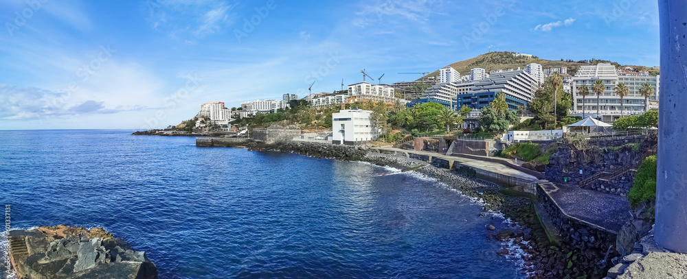 Panoramic view at the Gorgulho beach, various hotel buildings. Gavinas and Lido touristic zone on Funchal city, Madeira Island, Portugal
