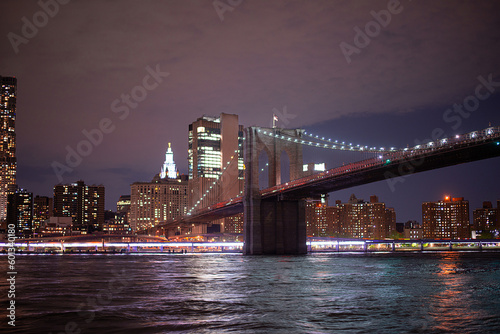 new york night view panorama of Manhattan and brooklyn bridge across the East River from Brooklyn photo