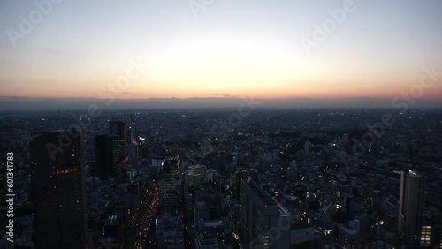 Wallpaper Mural TOKYO, JAPAN : Aerial high angle sunset or sunrise CITYSCAPE of TOKYO. View of buildings around Shibuya. Japanese city life and nature concept. Colorful gradation sky. Real time shot. Torontodigital.ca