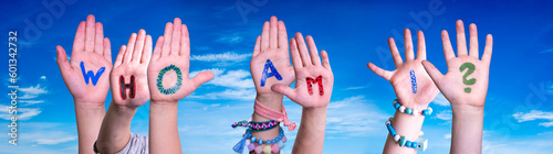 Children Hands Building Word Who Am I. Blue Sky
