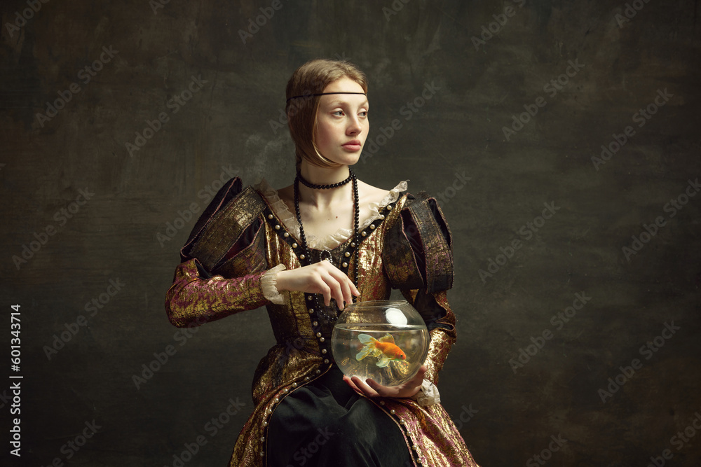 Portrait of royal person, young girl in vintage dress holding large aquarium against dark green background. Concept of history, renaissance art remake, comparison of eras - obrazy, fototapety, plakaty 