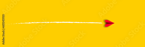 red plane flying on yellow background.red plane is changing its path Moving towards change. business creativity new idea discovery innovation technology. new year idea concept