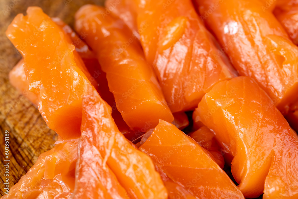 Sliced red trout meat with sea salt Sliced red trout meat with sea salt