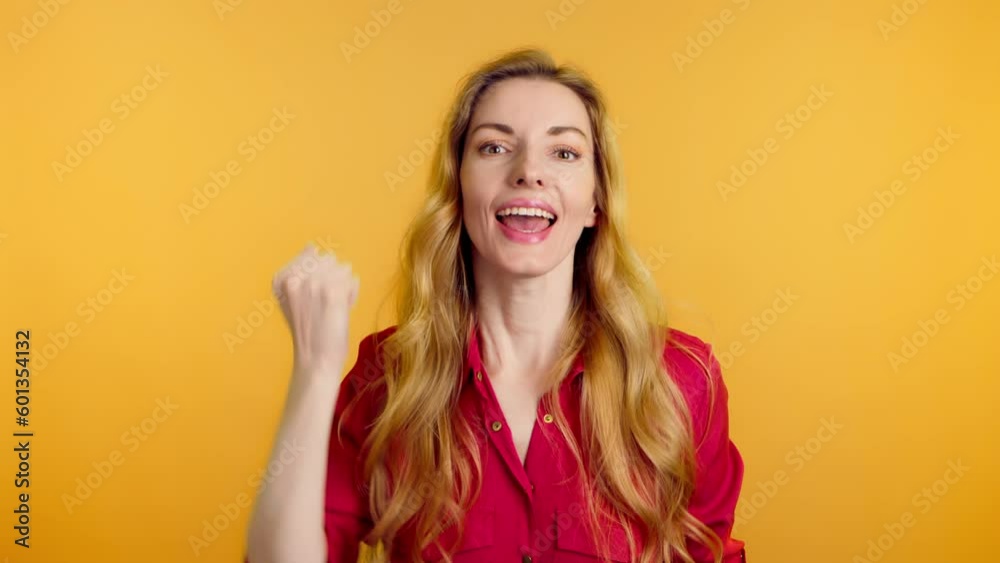 Yes gesture and winner woman smiling overjoyed nodding, say Yes. Positive optimistic happy young lady showing approving gesture, thumbs up, sincere emotions. Success lifestyle body language concept Yes gesture and winner woman smiling overjoyed nodding, say Yes. Positive optimistic happy young lady showing approving gesture, thumbs up, sincere emotions. Success lifestyle body language concept