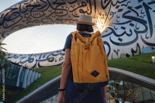 Canvas Print 20 March 2023, Dubai, UAE: happy Tourist asian woman near Museum of The Future -