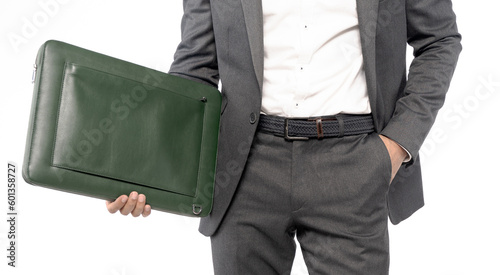 Businessman holding green leather laptop bag in studio white background © Ali