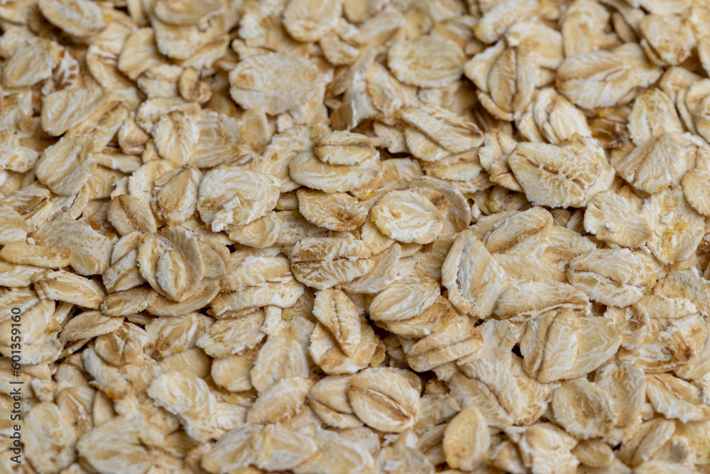 Poured a large amount of oat flakes close-up Poured a large amount of oat flakes close-up