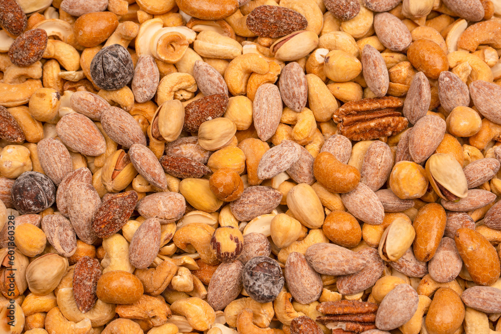 A group of almonds, pistachios, walnuts, macadamia, cashews. A group of almonds, pistachios, walnuts, macadamia, cashews.