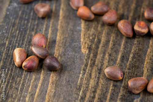 a bunch of pine nuts in the shell