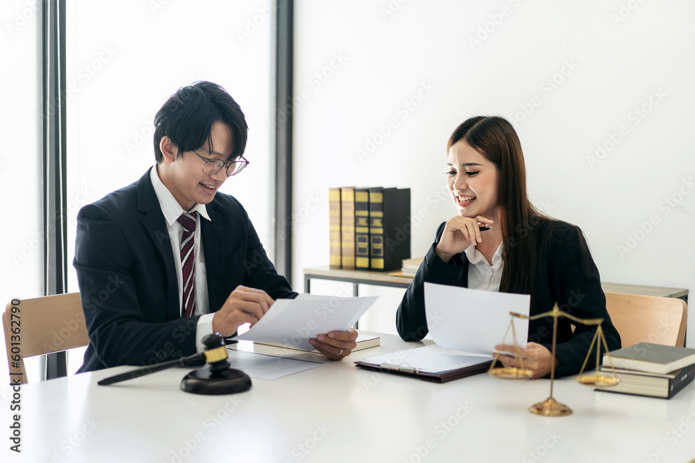 Female lawyer is discussing and legal advice about business cont Female lawyer is discussing and legal advice about business cont
