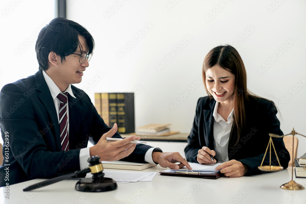 Female lawyer is discussing and legal advice about business cont Female lawyer is discussing and legal advice about business cont