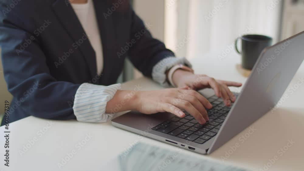 Close-up of hand typing keyboard on computer laptop in the office. Close-up of hand typing keyboard on computer laptop in the office.