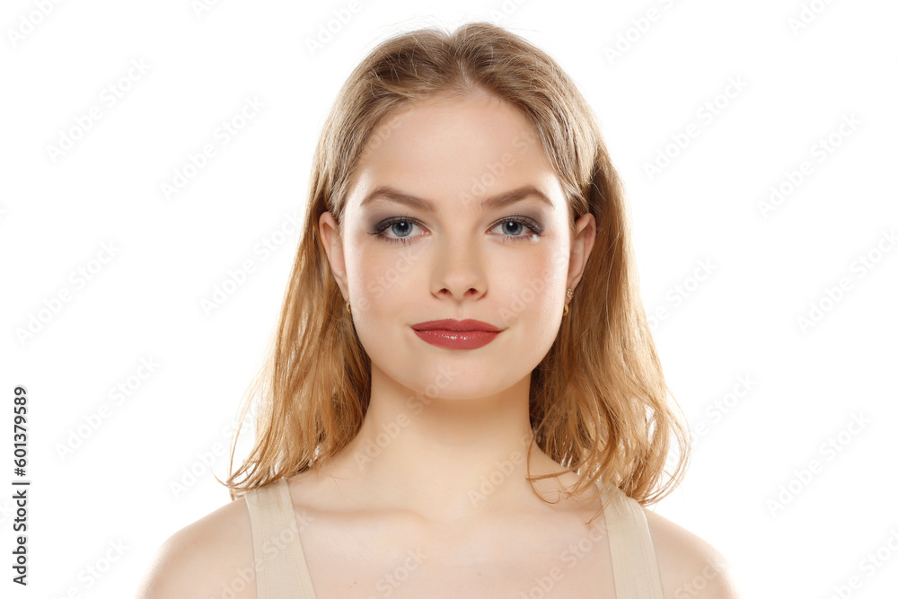 Portrait of young beautiful blonde woman with makeup on white background Portrait of young beautiful blonde woman with makeup on white background