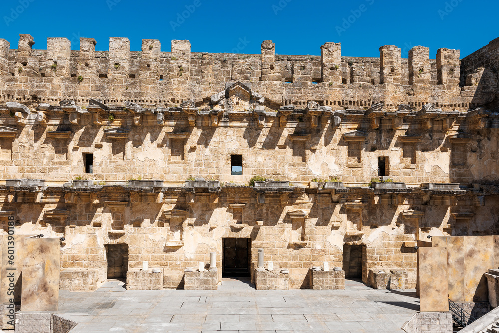 A shot of the stage at Aspendos ancient theater, showcasing the central area where performances took place in antiquity.