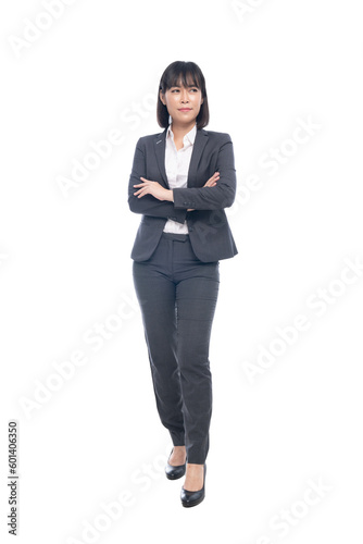 beautiful woman wearing a suit standing