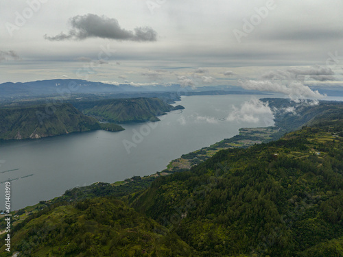 Aerial drone of Samosir Island and Lake Toba in Sumatra. Tropical landscape. Indonesia.