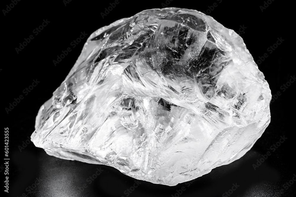 rough diamond, crystal in an allotropic form of carbon, uncut gemstone,  concept of luxury or wealth Stock Photo