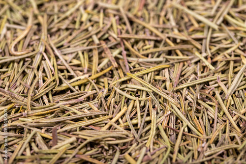 Dried rosemary spice background. Spices concept. Dry seasoning rosemary. Spices and herbs for cooking. Close up