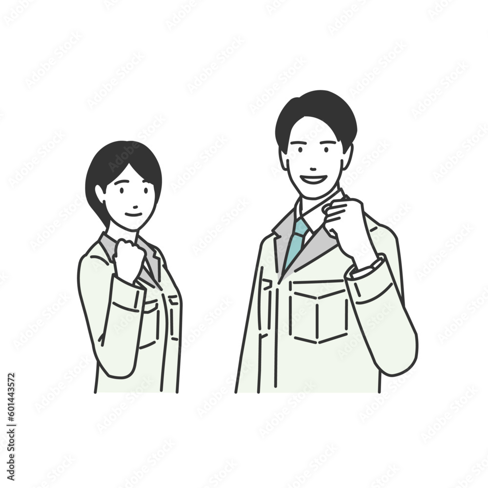 作業着の男性と女性 作業着の男性と女性