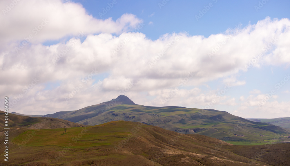 Green fields in the mountains.