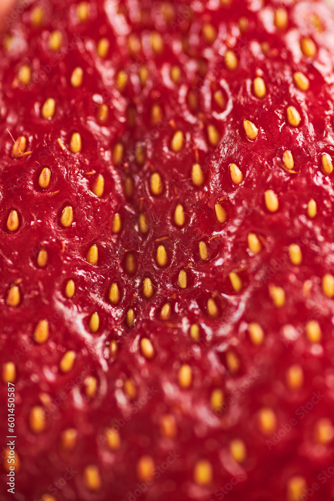 single srawberry with yellow seeds macro photo