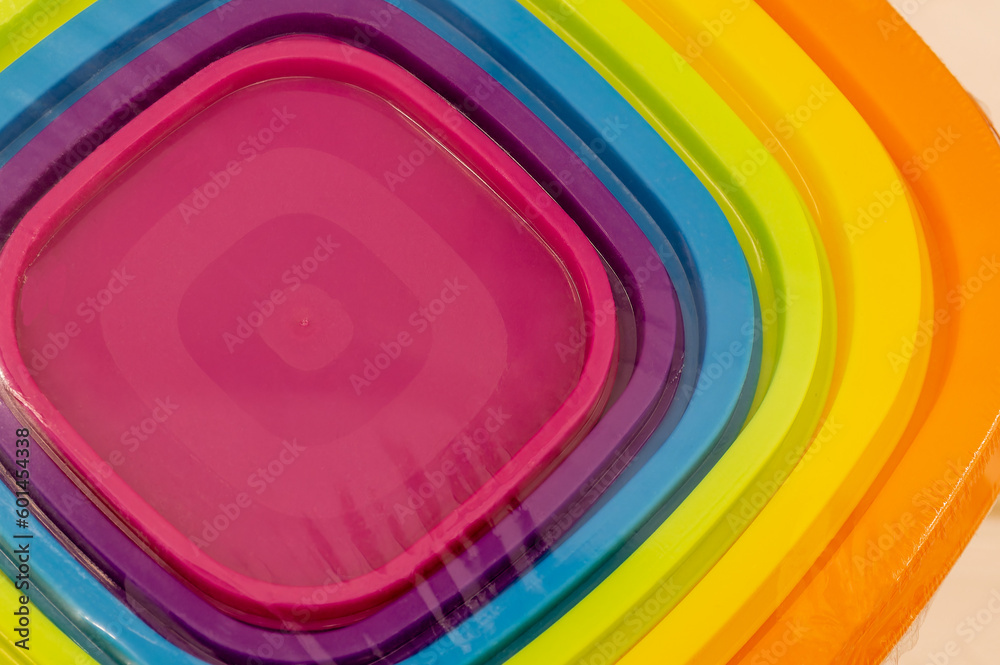 Obraz premium Multi-colored plastic containers nested inside each other