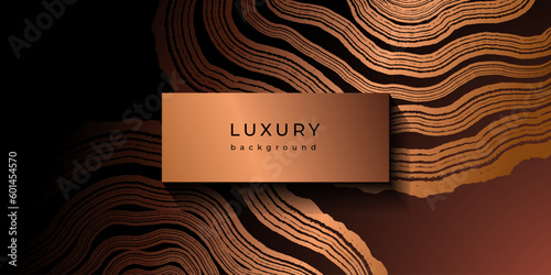 Luxury golden background with wood annual rings texture. Banner with shiny tree ring pattern. Stamp of tree trunk in section. Natural wooden concentric circles. Black and bronze gold background