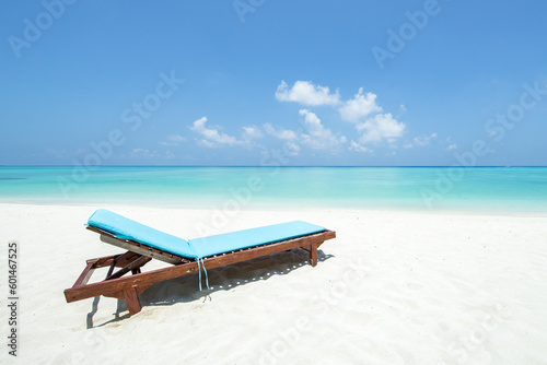 Fototapeta Naklejka Na Ścianę i Meble -  Summer vacation on a tropical island with beach chair