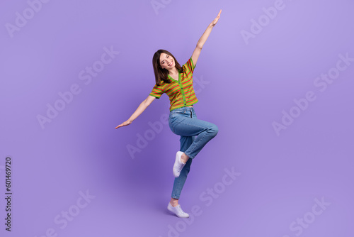 Full length photo of positive cute lady wear trendy clothes open two hands rejoice free time good mood isolated on purple color background
