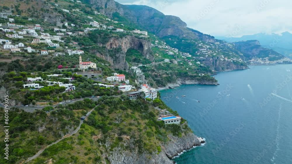 Aerial drone view of Conca dei Marini town on Amalfi Coast in Italy, Europe. Panoramic top view from above of Italian colourful houses, Chiesa San Pancrazio Martire and Torre Capo in ProRes 4K. Aerial drone view of Conca dei Marini town on Amalfi Coast in Italy, Europe. Panoramic top view from above of Italian colourful houses, Chiesa San Pancrazio Martire and Torre Capo in ProRes 4K.