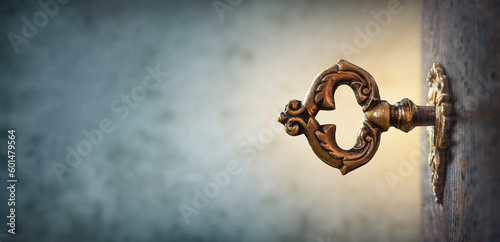 An old key in a keyhole on the background of an ancient manuscript, macro photography. Retro style. Concept and idea for history, education, business, security, secret background.
