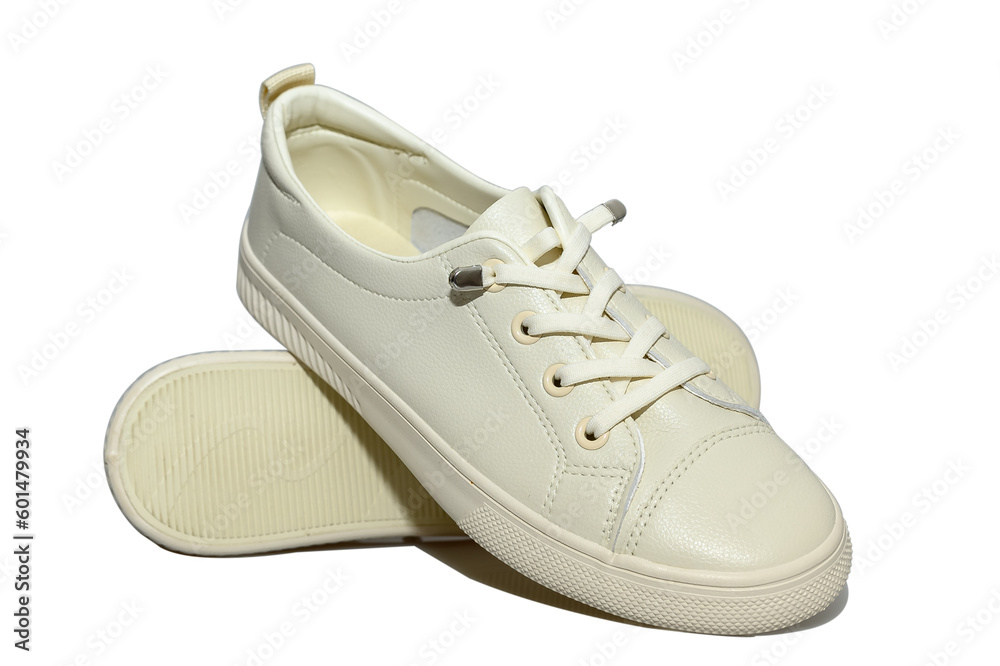 White unisex sneakers with white laces. Modern comfortable shoes. White unisex sneakers with white laces. Modern comfortable shoes.
