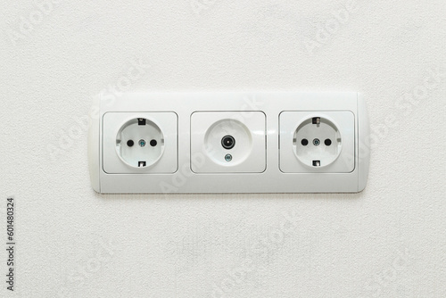 Sockets in the wall together with an input for an antenna for television.