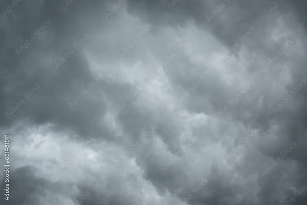 Dark sky with thunderstorm while raining. Dramatic black clouds before the rain.