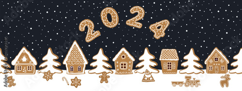 Gingerbread village. Christmas background. Seamless border. Fairytale winter landscape. Gingerbread houses, fir trees and other cookies on dark blue background. Greeting card template. Vector