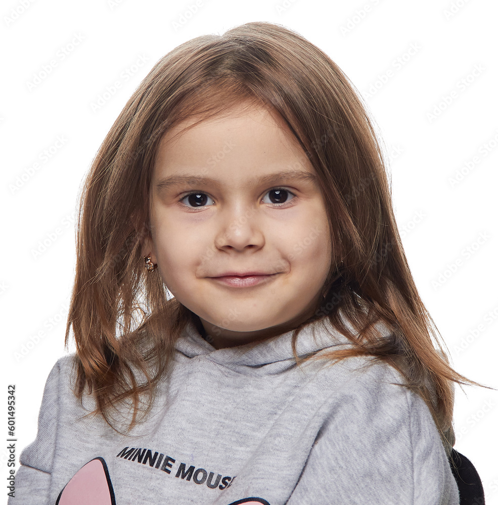 portrait of a happy little girl on a uniform background in the studio. portrait of a happy little girl on a uniform background in the studio.